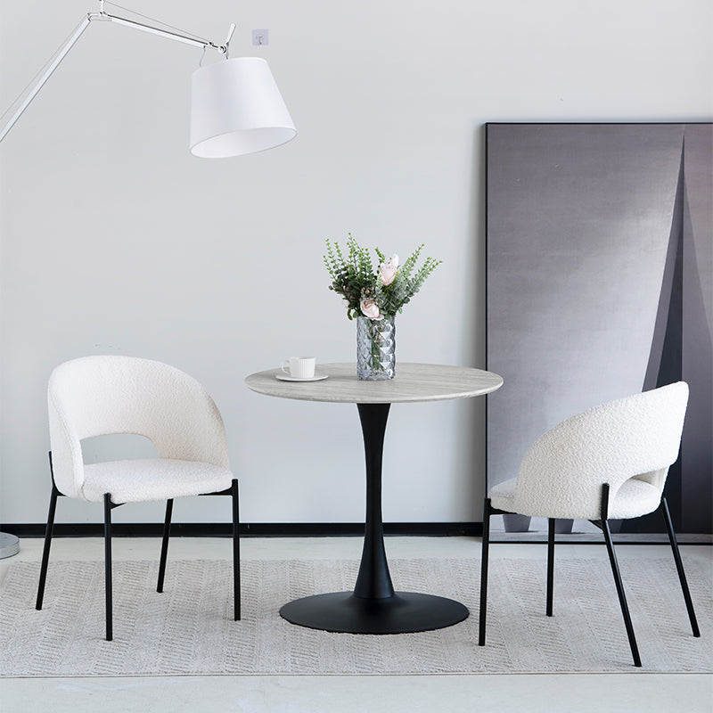 Apportez une touche de confort à votre salle à manger ou salon avec les Chaises de Salle à Manger Esme d’OFCASA (lot de 2) : dossiers courbés moelleux, pieds en métal robustes et tissu bouclé au goût du jour.