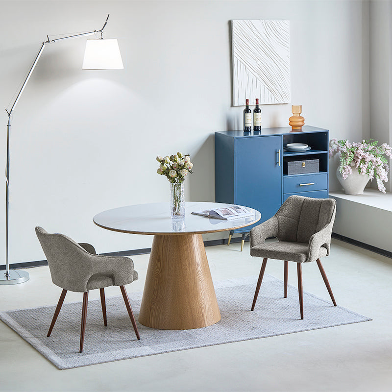 Découvrez les Fauteuils Salle à Manger en Lin Sage d’OFCASA : un revêtement en lin doux, des pieds métalliques effet noyer, et des accoudoirs confortables — parfaits pour des salles à manger élégantes et fonctionnelles.