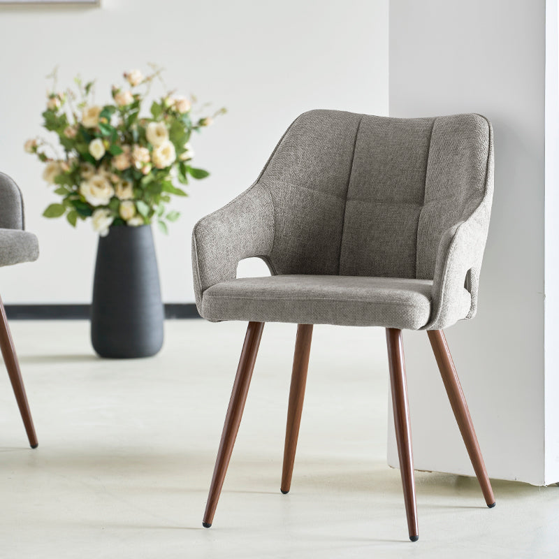 Découvrez les Fauteuils Salle à Manger en Lin Sage d’OFCASA : un revêtement en lin doux, des pieds métalliques effet noyer, et des accoudoirs confortables — parfaits pour des salles à manger élégantes et fonctionnelles.