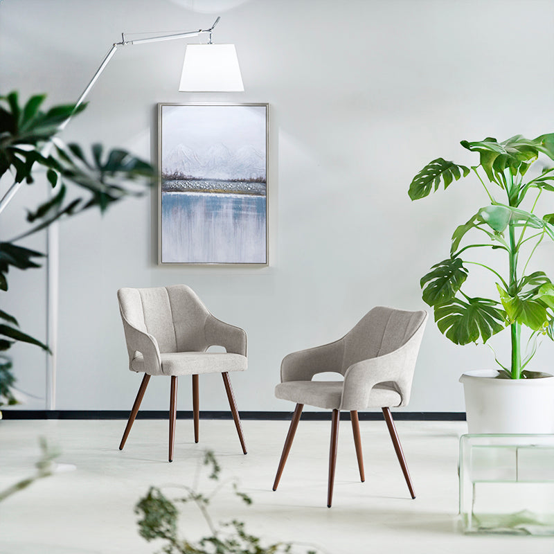 Découvrez les Fauteuils Salle à Manger en Lin Sage d’OFCASA : un revêtement en lin doux, des pieds métalliques effet noyer, et des accoudoirs confortables — parfaits pour des salles à manger élégantes et fonctionnelles.