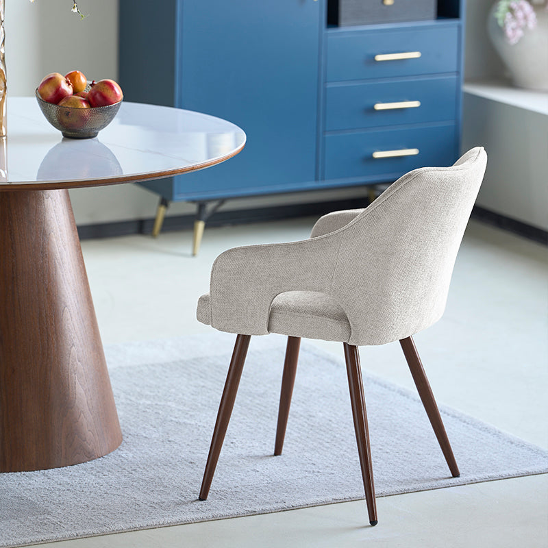 Découvrez les Fauteuils Salle à Manger en Lin Sage d’OFCASA : un revêtement en lin doux, des pieds métalliques effet noyer, et des accoudoirs confortables — parfaits pour des salles à manger élégantes et fonctionnelles.