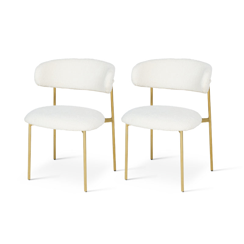 Apportez une touche d’élégance à votre salle à manger avec les Chaises de Salle à Manger Zahra X d’OFCASA : tissu bouclé chaleureux, dossier large structuré et pieds en chrome doré raffiné. Vendues par lot de 2, elles allient confort et style pour sublimer votre intérieur.