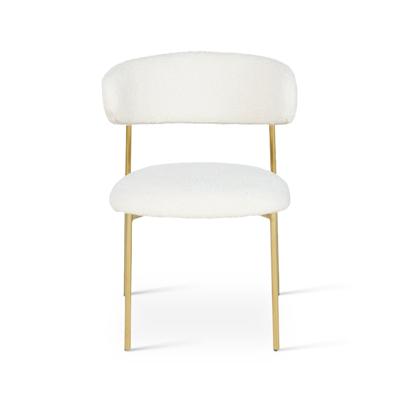 Apportez une touche d’élégance à votre salle à manger avec les Chaises de Salle à Manger Zahra X d’OFCASA : tissu bouclé chaleureux, dossier large structuré et pieds en chrome doré raffiné. Vendues par lot de 2, elles allient confort et style pour sublimer votre intérieur.
